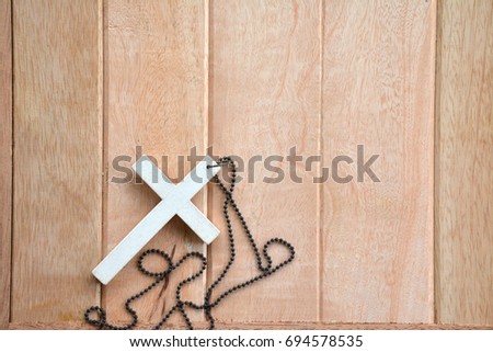 A cross on a wooden floor