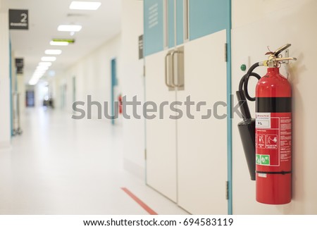 Fire extinguisher in the operating department Royalty-Free Stock Photo #694583119