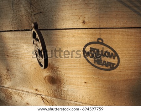 follow your heart wooden sign shade with wooden background