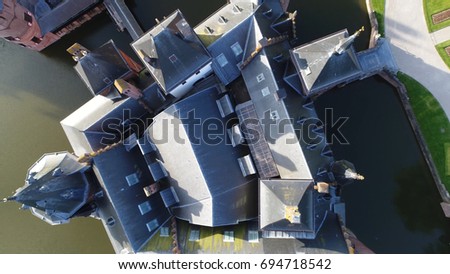 Aerial top down photo of Castle de Haar in dutch Kasteel de Haar drone moving up and looking down at old castle located near Haarzuilens in the municipality of Utrecht in the Netherlands