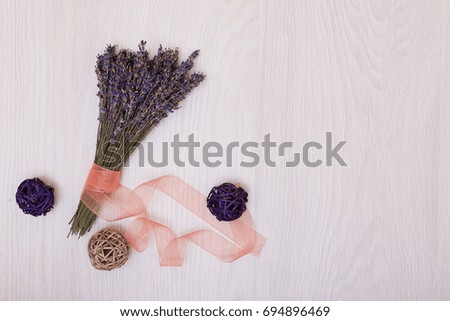 Lavender desk design with flowers on background top view mock up