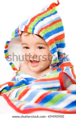 Portrait of happy 8 months old Baby girl in vivid colors.?