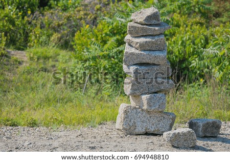 mysterious stack of granite blocks in wilderness