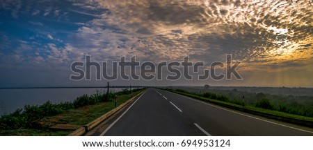 Sunrise at Udawalawe National Park, Sri Lanka, on the road coming from Tangalle. Royalty-Free Stock Photo #694953124