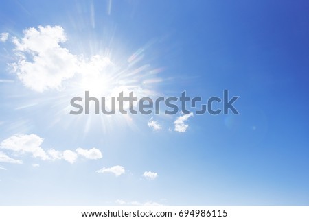 Sun and clouds Royalty-Free Stock Photo #694986115