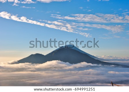View of from Mount Batur in Bali. The Mountain on the picture is the Gunung Agung.
