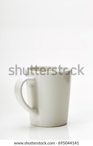 White brand mug empty for coffee or tea isolated on white background