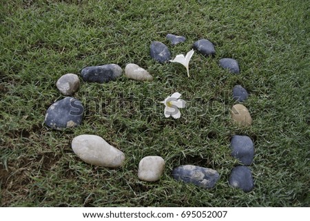 heart of love made by using beach stones
