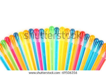 Set of multi-colored sticks for a canape on a white background