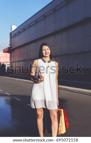 Teen lady going to shopping in time square in New York.
