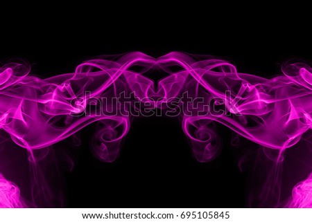 Abstract art of pink smoke on black background
