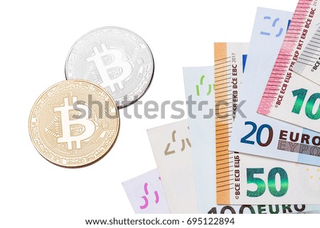 Golden and silver Bitcoins close-up Bitcoins and euros on white background.  High resolution photo.