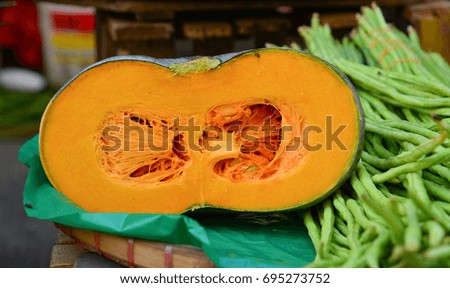 Yellow pumpkin at rural market in Manila, Philippines.