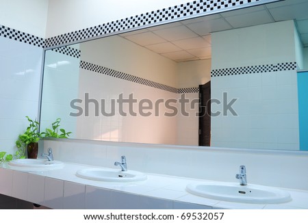 Bathroom at office.Handbasin and mirror in toilet Royalty-Free Stock Photo #69532057