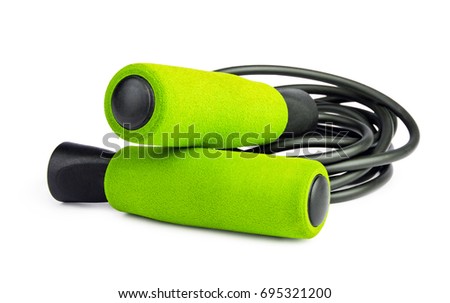Green jump rope or skipping rope isolated on white background. Sports, fitness, cardio, martial art and boxing accessories. Royalty-Free Stock Photo #695321200