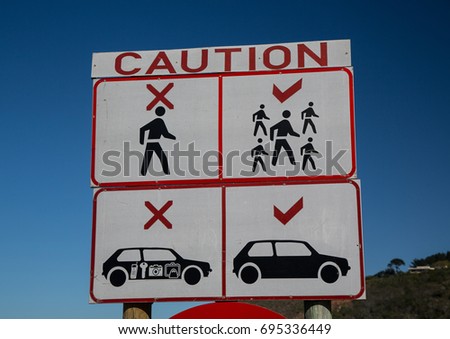 Warning sign at a parking lot near the Kaaimans River Pass in South Africa