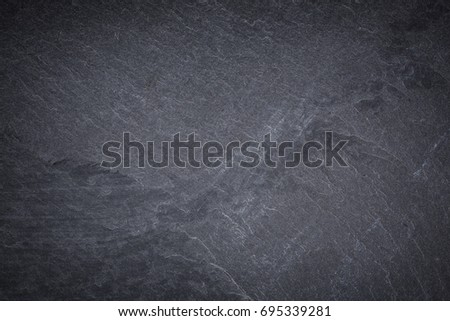 Dark grey and black slate texture, abstract background