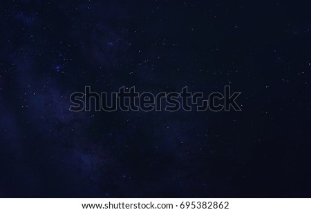 Night sky full of stars and sunrise on the background horizon. Beautiful view from the top of the mountain. Elements of this image furnished by NASA.
