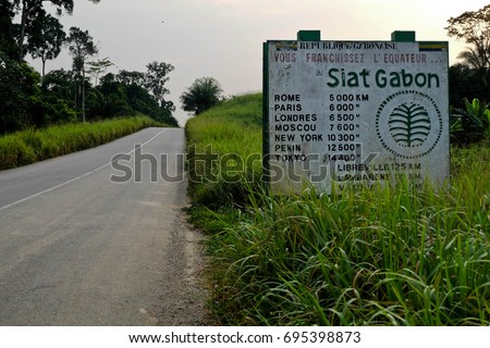Equator sign in Gabon Royalty-Free Stock Photo #695398873