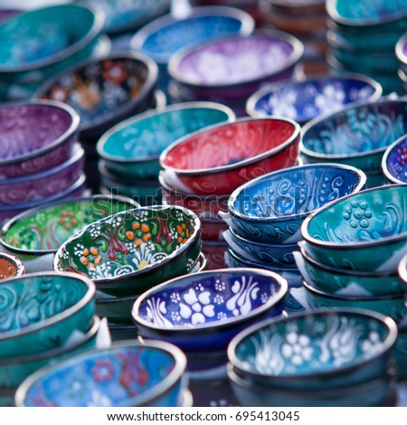 Many beautiful multi-colored ceramic pial painted in oriental style