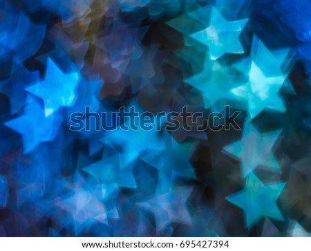 Beautiful background with different colored  star, abstract background, star shapes on black background, blurry