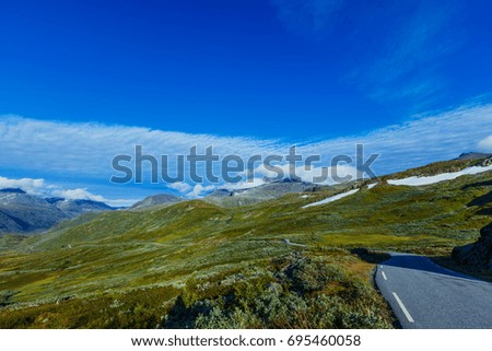 Summer Norway road landscape on high mountains.