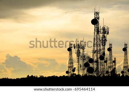 silhouette satellite dish telecom network at sunset communication technology network Royalty-Free Stock Photo #695464114