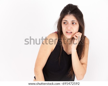 Fear emotional girl on a light background