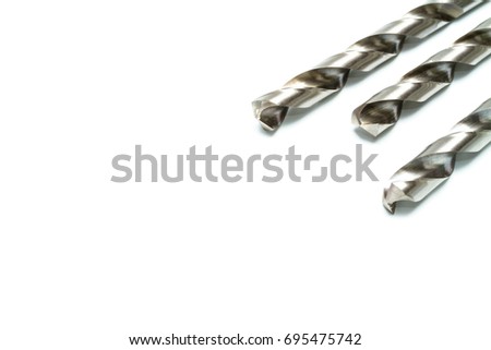 Close up three head of Drill bits for wood and steel drills isolated on white background