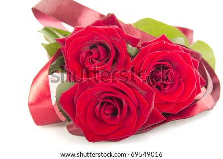 Decorated red roses isolated on white background