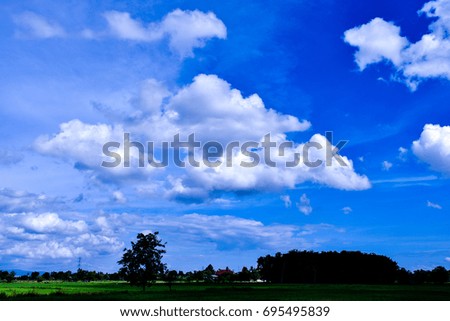 Clouds and sky above the field