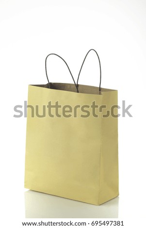 Environment  Friendly  Paper Shopping Bag On White Background Shot In Studio.