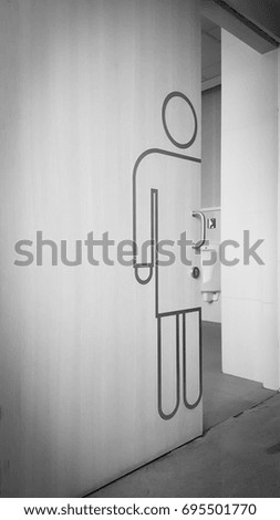 Black and white toilet door