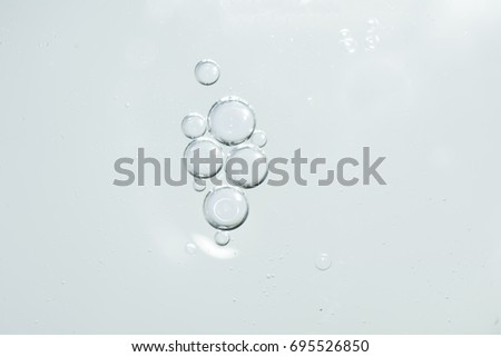 isolated vertical bubbles oil   Royalty-Free Stock Photo #695526850