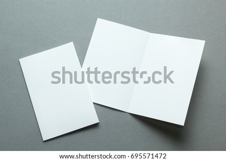 A layout for menu or brochures on a gray background. Royalty-Free Stock Photo #695571472