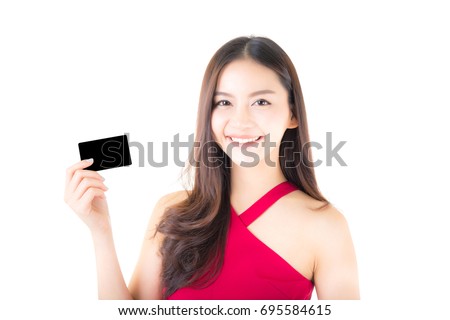 Asian young woman with red dress holding a credit card thinking to spend money lots isolated on white background.