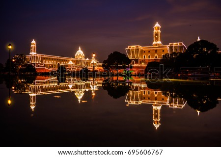 DELHI, INDIA - AUGUST, 2017: Illuminated President House in India with reflection on the occasion of 70th Independence Day Royalty-Free Stock Photo #695606767