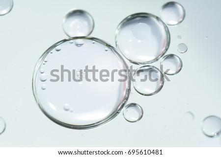 closeup bubbles on water Royalty-Free Stock Photo #695610481