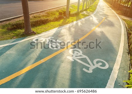 Road pathway in the park for relaxing walking jogging or ride bicycle and exercise