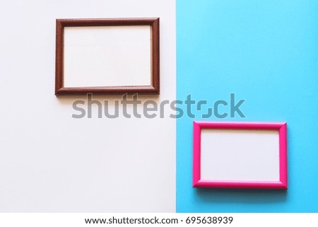 photo frame over isolated and blue background,copy space.
