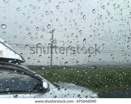 Rain drop with car transport  background