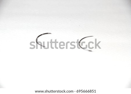 Surgical Needles on white background 