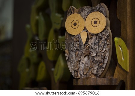 Picture of a toy owl made of wood