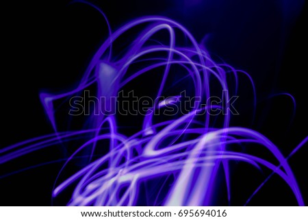 Purple Light Trails in the Dark