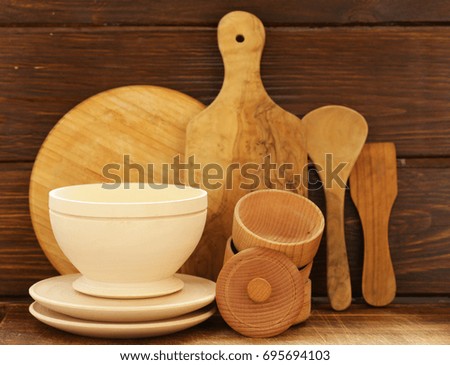 Wooden utensils, cups, plates, spoons - rustic style