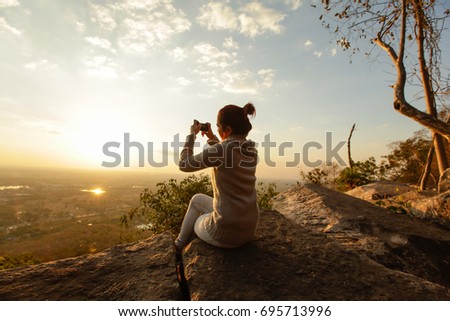 Women selfie landscape sunset.