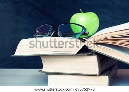 School Supplies with Apple and Chalkboard