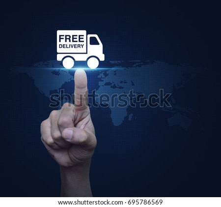 Hand pressing free delivery truck icon over digital world map technology style, Transportation business concept, Elements of this image furnished by NASA