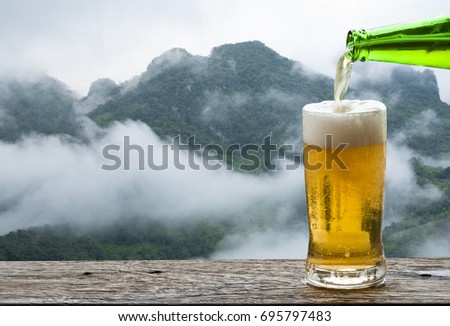 Enjoy beer with mountain landscape.
