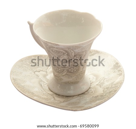 cup with roses on a white background
